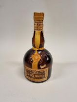 An old 70cl bottle of Grand Marnier 'Cordon Jaune' Liqueur.