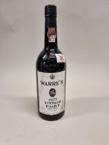 A 75cl bottle of Warre's 1977 Vintage Port.