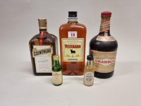 A mixed group of Spirits and Liqueurs, comprising: a 1 litre Cointreau; a 1 litre Drambuie; a 1
