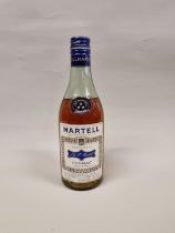 An old 12 fl.oz. bottle of Martell 'Three Star' Cognac, probably 1970s bottling.