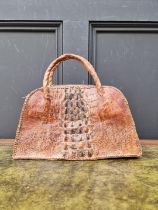A vintage crocodile handbag, 34cm wide.