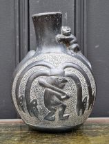 A pre-Columbian style Chimu blackware vase, 20cm high.