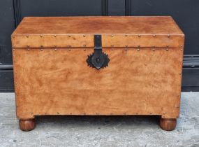 A reproduction tan leather covered hardwood chest, with brass studs, 74cm wide.