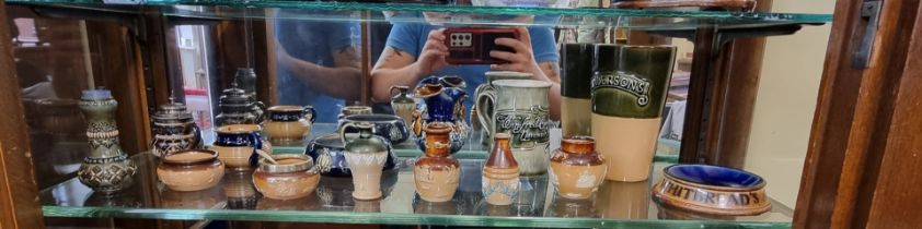 A group of Royal Doulton and Doulton Lambeth stoneware items, largest 14.5cm high. (14)