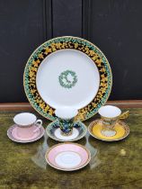 A Rosenthal Versace 'Gold Ivy' plate, 27cm diameter; together with matching cup and saucer, (chip to