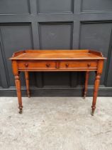 A Victorian mahogany washstand, 106cm wide.