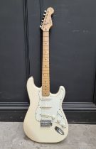 A Squire by Fender Stratocaster 50th anniversary electric guitar.