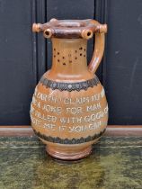 A Doulton Lambeth stoneware puzzle jug, 23cm high.
