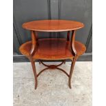 A late Victorian mahogany and inlaid etagere, with detachable tray top, 76.5cm wide.