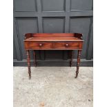 An early Victorian mahogany washstand, 101.5cm wide.