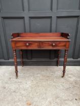 An early Victorian mahogany washstand, 101.5cm wide.