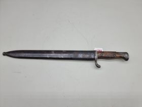 A German World War I G98/05 Mauser 'Butcher' bayonet and steel scabbard, stamped 'Ferd Esser & Co
