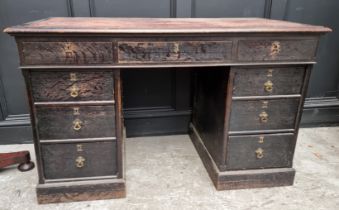 A Victorian stained oak pedestal desk, with dummy drawers to the opposing side. 125cm wide.