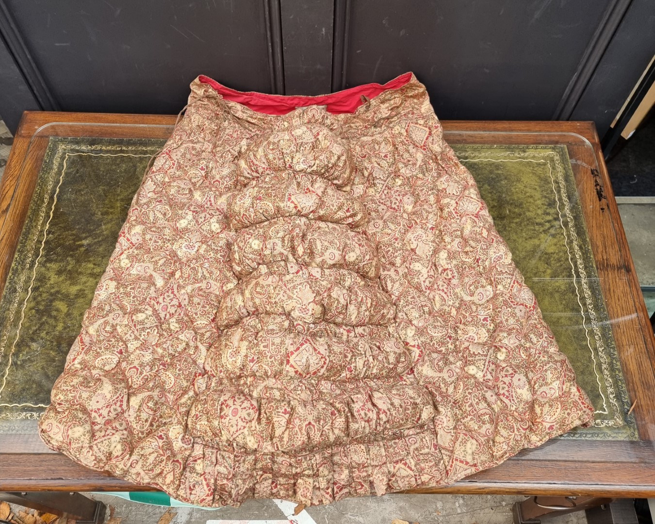 Textiles: two McLintock's 'Purfied Russian Down' Skirts; together with a similar bustle or