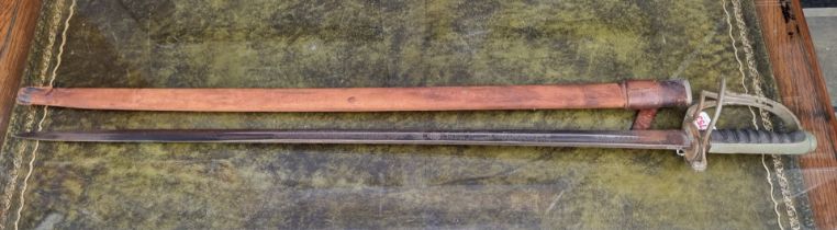 A George V Army Service Corps officer's sword, in field service scabbard, by Henry Wilkinson.
