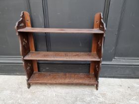 An old oak hanging open bookshelf, 59cm high x 57.5cm wide.