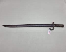 A French M1866 chassepot 'Yataghan' sword bayonet and steel scabbard, dated 1872.