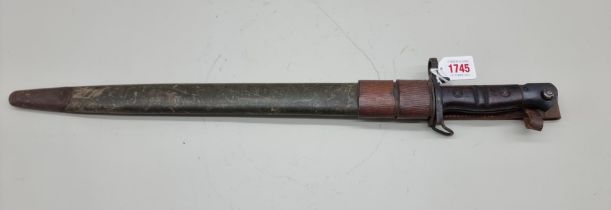 A US World War I M1917 pattern Remington bayonet and scabbard.