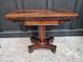 An early Victorian rosewood pedestal card table, 91.5cm wide.