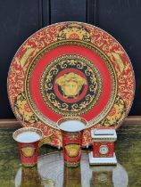 A Rosenthal Versace 'Medusa' plate, clock, vase and cup, the plate 31cm diameter. (4)