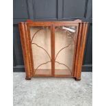 An 1930s mahogany display cabinet, 119.5cm wide.