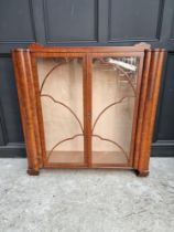 An 1930s mahogany display cabinet, 119.5cm wide.