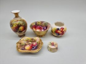 A collection of Royal Worcester fruit painted items, largest 12.5cm high, (chip to rim). (5)
