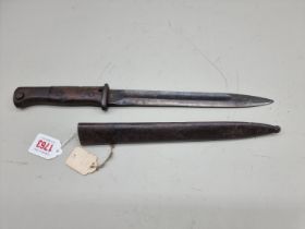 A German World War II K98 bayonet and scabbard, the blade stamped '41 FNJ', the scabbard stamped '44