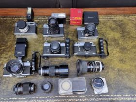 Cameras: three Zenit-E 35mm cameras; a G Yashica GS camera; a Zorki-4; various lenses and related.