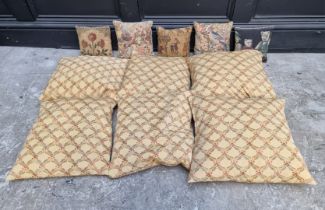 A set of six cushions; together with five smaller cushions.