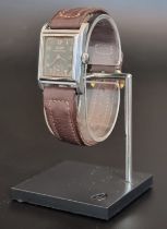A circa 1940s Tissot manual wind wristwatch, 23mm, Serial No.1068986, on a replacement leather
