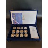 Coins: a 2000 Royal Mint 'The Queen Mother Centenary Collection', containing 12 silver proof