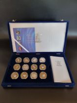 Coins: a 2000 Royal Mint 'The Queen Mother Centenary Collection', containing 12 silver proof