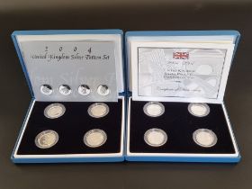 Coins: a 2004 Royal Mint 'UK Silver Pattern Set', containing four silver proof one pound coins, with