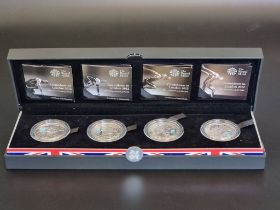 Coins: a 2012 Royal Mint 'Countdown To London 2012' silver proof £5 coin collection, containing four