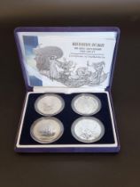 Coins: a Royal Mint 'Britannia Design' silver proof coin set, containing four 1oz silver Britannia