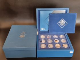 Coins: a 2012 Royal Mint The Queen's Diamond Jubilee Collection 'Family Tree' silver proof twenty