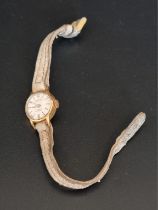 A vintage Sully manual wind ladies wristwatch, 16mm, stamped 18k, on a later leather strap.