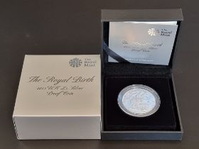 Coins: a 2013 Royal Mint 'The Royal Birth' silver proof £5 coin, with CoA, boxed.