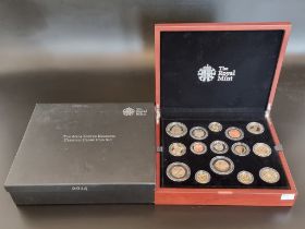 Coins: a 2014 Royal Mint 'UK Premium Proof Set', containing fourteen coins, with CoA No.1650/4500,