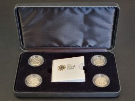 Coins: a 2010 Royal Mint 'Four Cities' silver proof Piedfort collection, containing four £1 coins,