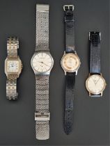 A vintage Longines manual wind wristwatch, 33mm; together with three other wristwatches. (4)