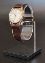 A circa 1947 Longines 9ct gold manual wind wristwatch, 30mm, Serial No.7345198, on leather strap.