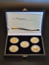 Coins: a 2006 Royal Mint 'Britannia Golden Silhouette Collection', containing five silver proof £2