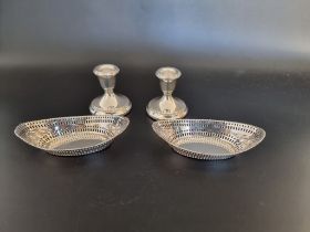 A pair of silver pierced oval bonbon dishes, Edinburgh 1902, 14cm long, 122g; together with a pair