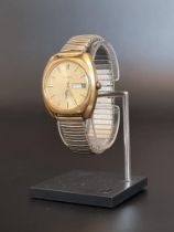 A vintage Garrard gold plated automatic wristwatch, 35mm, with engraved presentation from Leyland