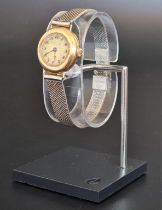 A Tiffany & Co 18ct gold manual wind ladies wristwatch, 25mm, having Swiss movement, import mark
