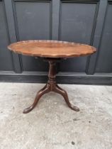 A George III mahogany tilt-top pie crust tripod table, with one-piece top and birdcage action, 85.