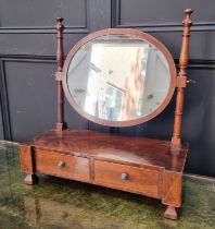 An early 19th century mahogany and line inlaid toilet mirror, 53.5cm wide.