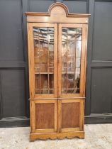 A 1920s oak bookcase, 94.5cm wide.